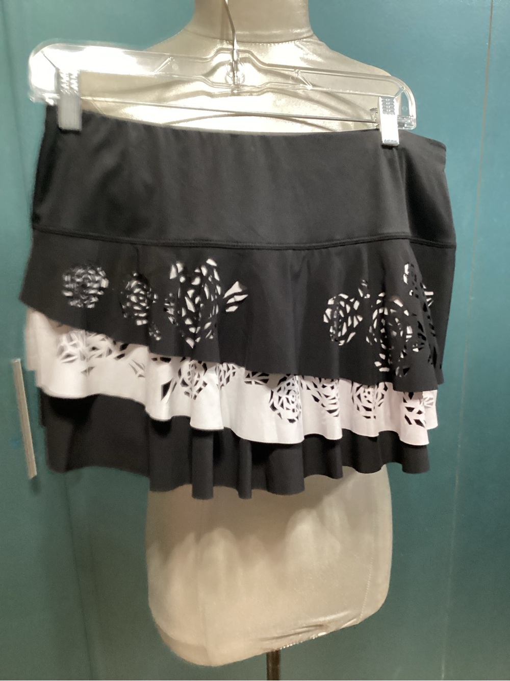 Laser cut lucky in luv tennis skirt